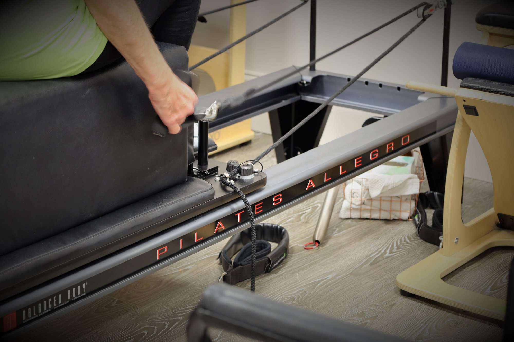 Close-up of a Balanced Body Allegro reformer in the studio